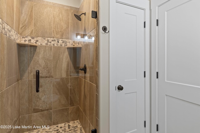 bathroom with an enclosed shower