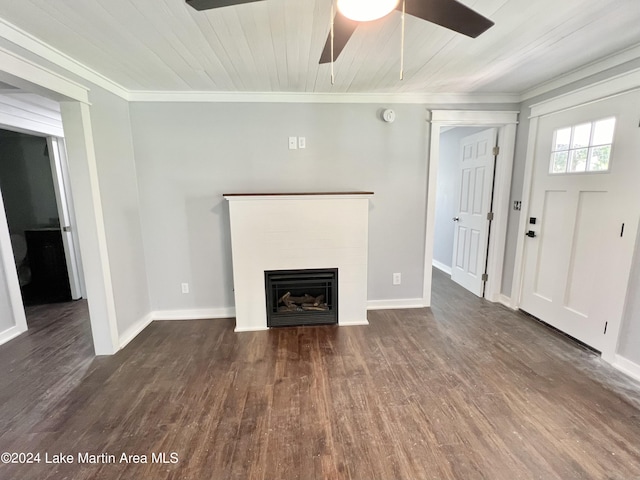 unfurnished living room featuring dark hardwood / wood-style flooring, wooden ceiling, and ornamental molding