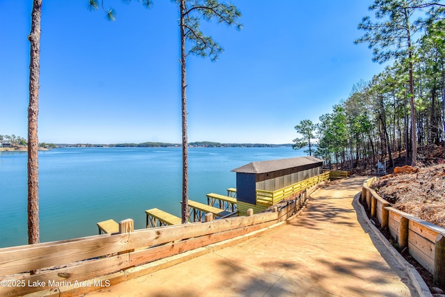 dock area featuring a water view