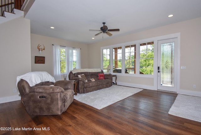 living area featuring dark wood-style flooring, baseboards, a ceiling fan, and recessed lighting