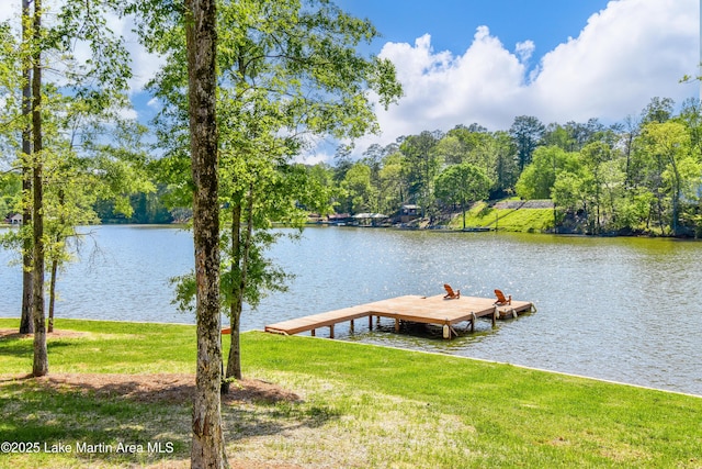 view of dock featuring a water view and a lawn