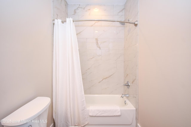 full bathroom featuring toilet and shower / bathtub combination with curtain