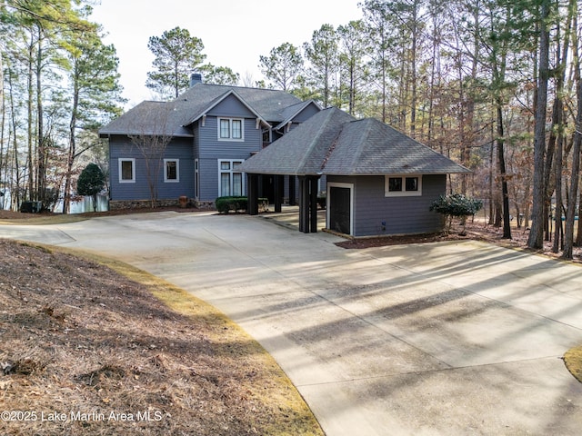 72 Stoney Ridge Rdg, Alexander City, AL 35010 - view of front of property with a chimney, a shingled roof, and concrete driveway