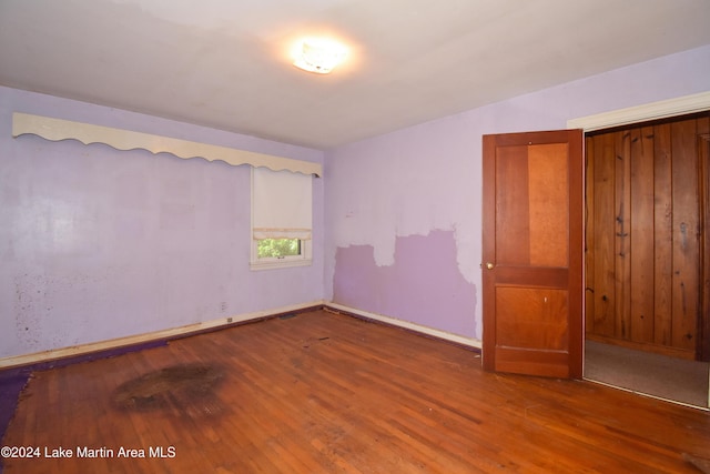 empty room featuring hardwood / wood-style floors