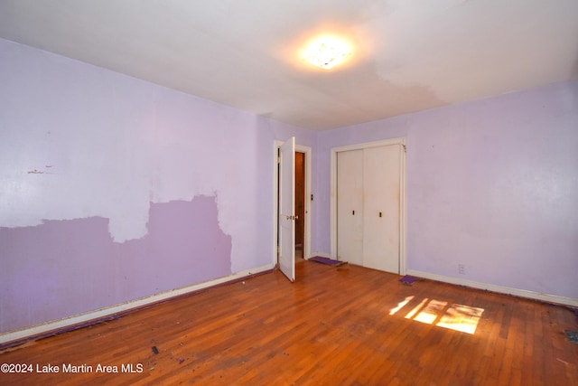 empty room featuring hardwood / wood-style floors