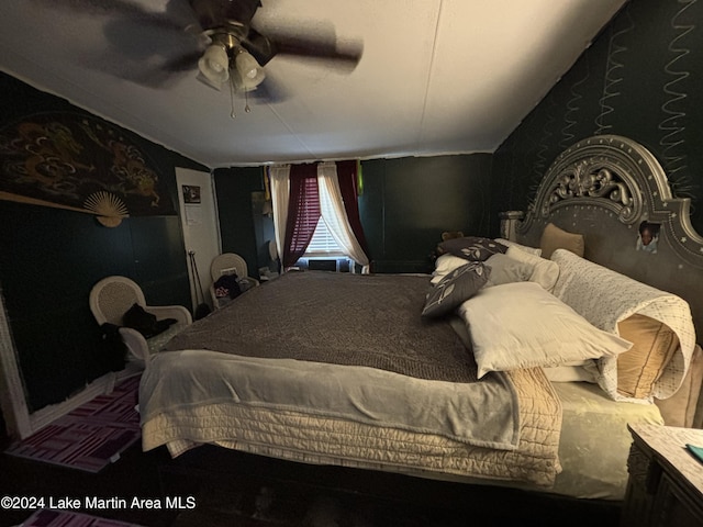 bedroom with vaulted ceiling and ceiling fan