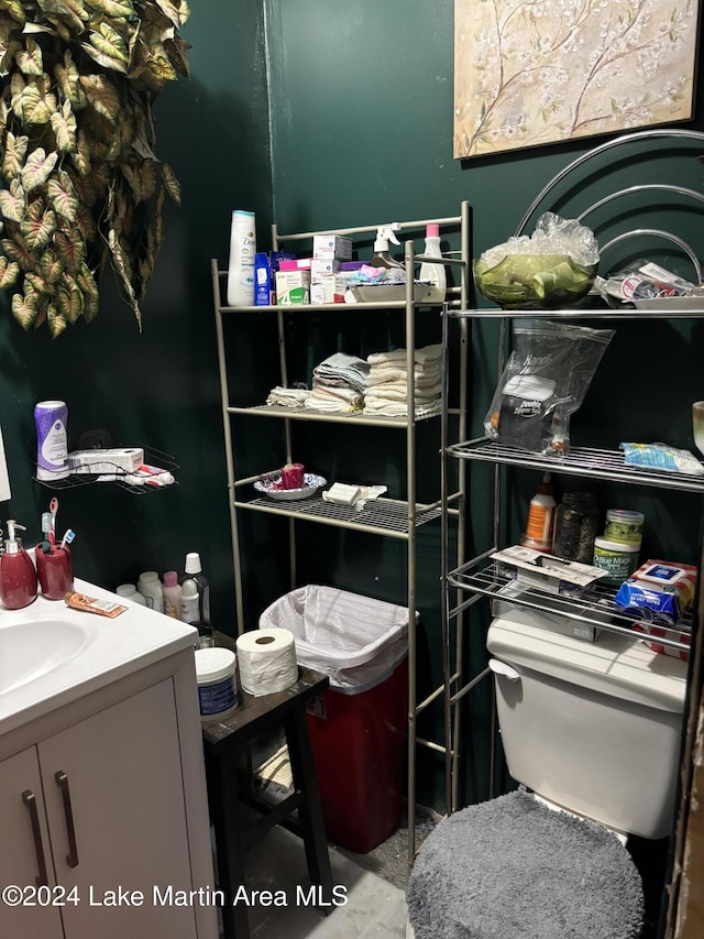 bathroom with vanity and toilet