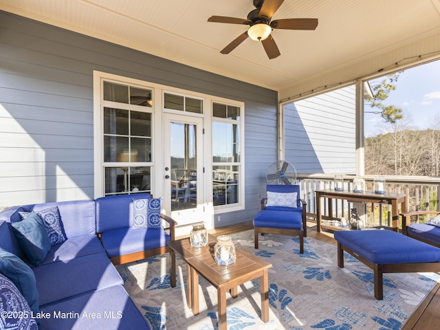 exterior space featuring ceiling fan and an outdoor hangout area