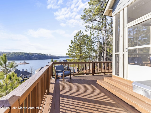 deck featuring a water view