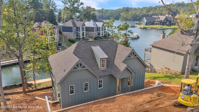 exterior space with a water view