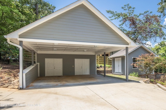 310 Hillwood, Dadeville, AL 36853 - view of front facade with a carport, driveway, and an outdoor structure