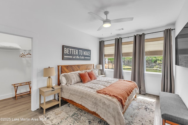 285 Magnolia Way, Dadeville, AL 36853 - bedroom with multiple windows, wood finished floors, and baseboards