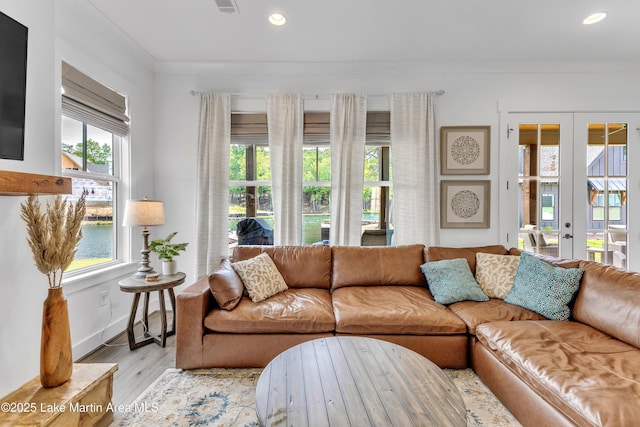 285 Magnolia Way, Dadeville, AL 36853 - living area featuring light wood-style floors, recessed lighting, french doors, crown molding, and baseboards