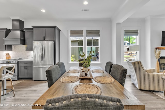 285 Magnolia Way, Dadeville, AL 36853 - dining room featuring light wood-type flooring, recessed lighting, and crown molding