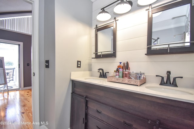 bathroom featuring vanity and wood-type flooring