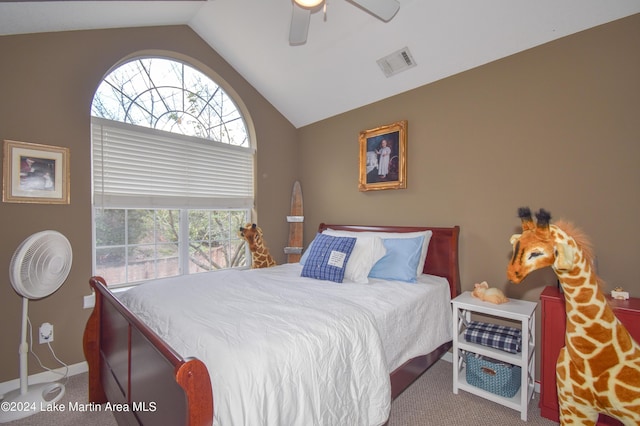 bedroom with carpet flooring, ceiling fan, and vaulted ceiling