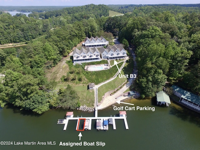 birds eye view of property with a water view