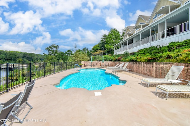 view of pool with a patio area