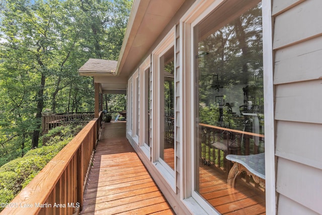 195 Honeysuckle Hl, Tallassee, AL 36078 - wooden deck with view of wooded area