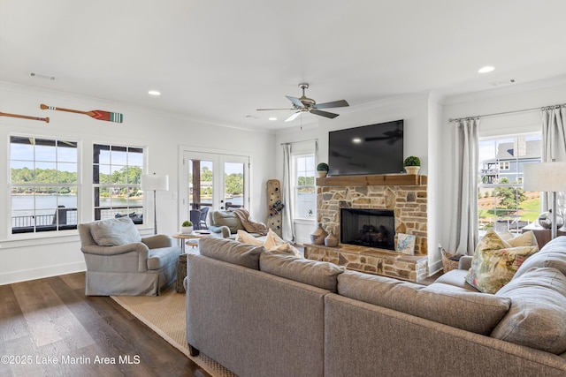 20 Heart Pine Ln, Dadeville, AL 36853 - living room with dark wood-type flooring, crown molding, a stone fireplace, recessed lighting, and ceiling fan