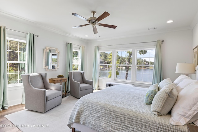 20 Heart Pine Ln, Dadeville, AL 36853 - bedroom featuring a water view, crown molding, recessed lighting, wood finished floors, and a ceiling fan