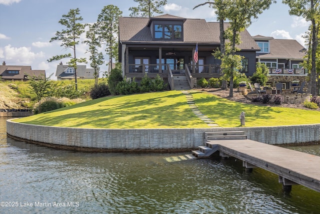 20 Heart Pine Ln, Dadeville, AL 36853 - rear view of property featuring a water view, a lawn, stairway, a ceiling fan, and a shingled roof