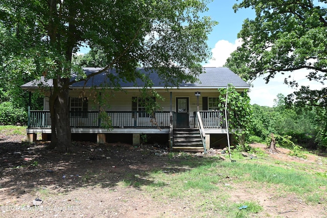 382 Daniel Rd, Kellyton, AL 35089 - view of front of home with a porch, roof with shingles, and stairway