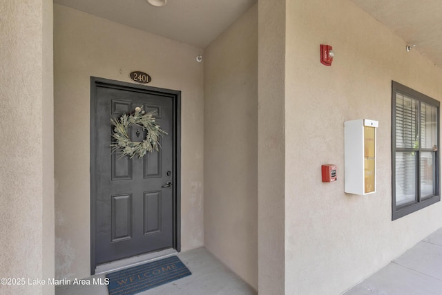48 Stoneview Summit Ct Unit 2401, Dadeville, AL 36853 - doorway to property with stucco siding