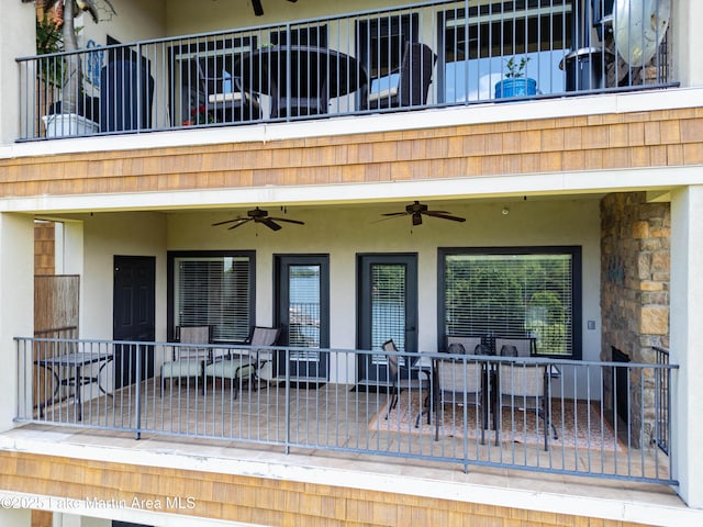 48 Stoneview Summit Ct Unit 2401, Dadeville, AL 36853 - view of patio / terrace with a balcony, ceiling fan, and outdoor dining space
