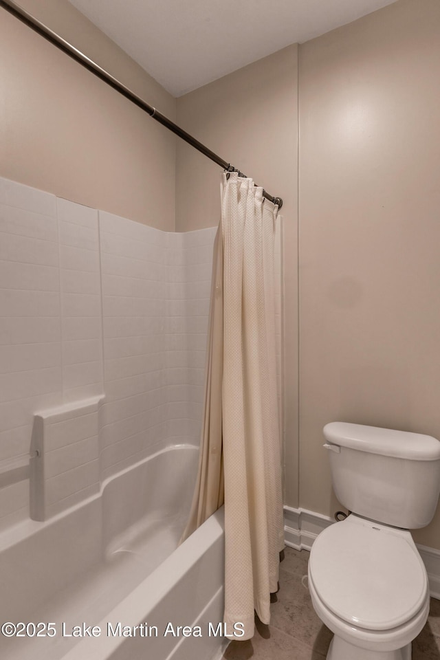 48 Stoneview Summit Ct Unit 2401, Dadeville, AL 36853 - bathroom featuring toilet, shower / tub combo with curtain, tile patterned flooring, and baseboards