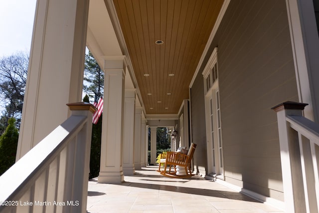doorway to property featuring a porch