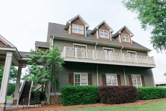 6261 Thach Rd, Montgomery, AL 36117 - view of front of home featuring a balcony and a shingled roof