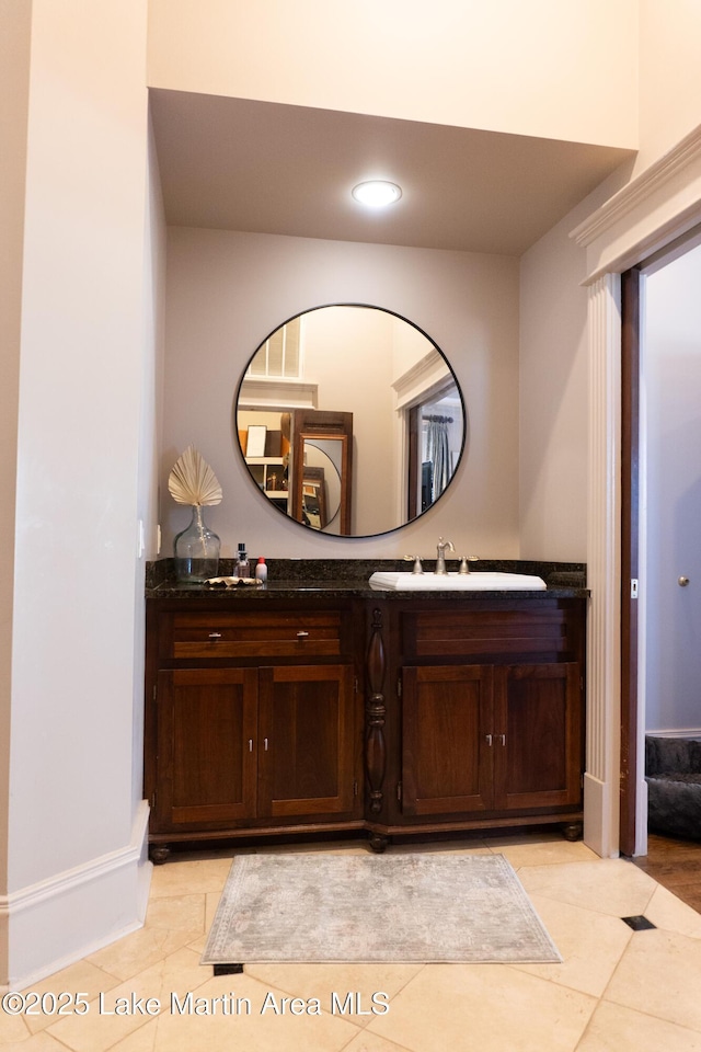 bathroom featuring recessed lighting, tile patterned flooring, and vanity