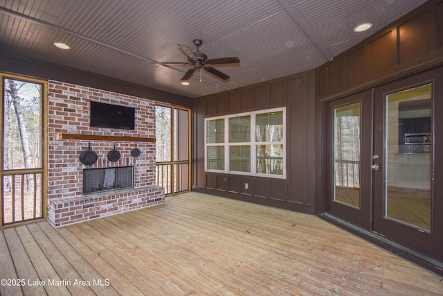 unfurnished sunroom featuring french doors