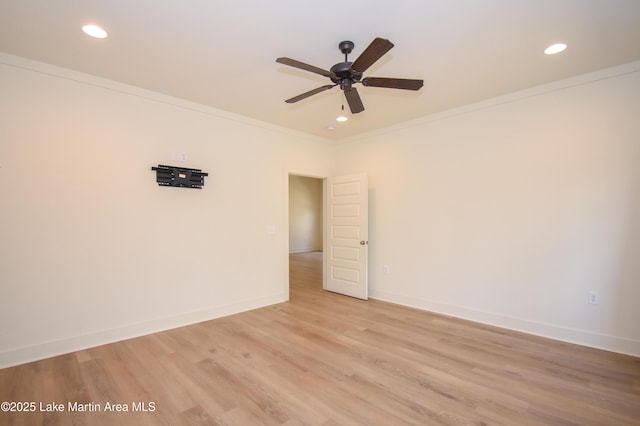 unfurnished room featuring baseboards, light wood-type flooring, recessed lighting, a ceiling fan, and crown molding
