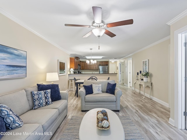 living room with crown molding, light hardwood / wood-style flooring, and ceiling fan with notable chandelier