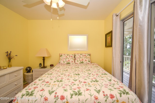 bedroom featuring ceiling fan and access to exterior