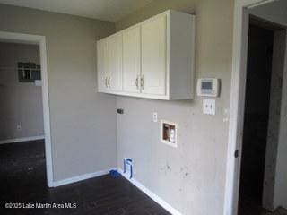 1415 Lee Road 219, Phenix City, AL 36870 - washroom with washer hookup, cabinet space, and dark wood-style floors