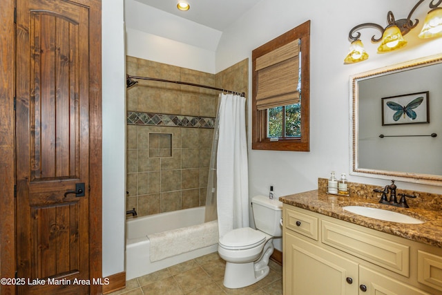 full bathroom with shower / bathtub combination with curtain, vanity, vaulted ceiling, tile patterned floors, and toilet