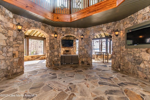 unfurnished living room with wood ceiling