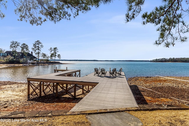 view of dock with a water view