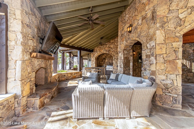 view of patio / terrace featuring an outdoor living space, area for grilling, and ceiling fan