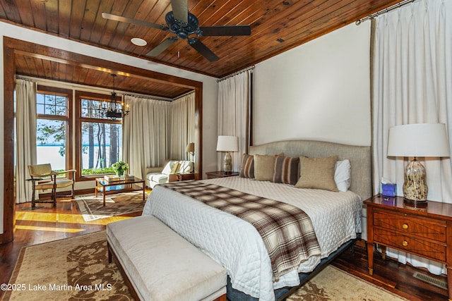 bedroom featuring hardwood / wood-style flooring, an inviting chandelier, and wooden ceiling