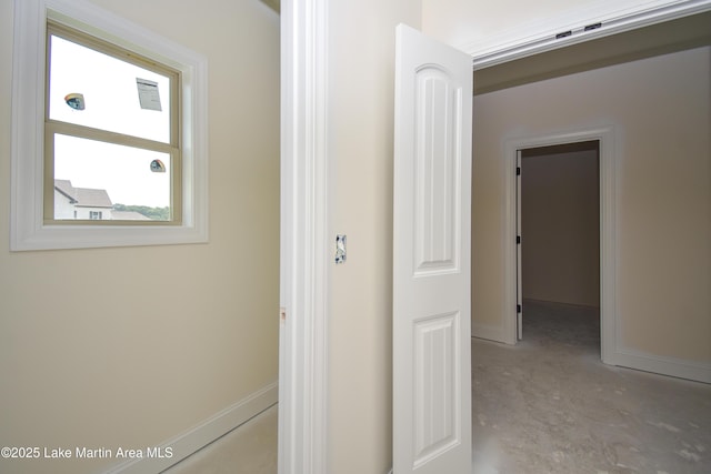 63 Noles Dr, Tallassee, AL 36078 - hall with baseboards and concrete floors