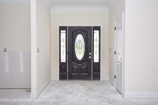 63 Noles Dr, Tallassee, AL 36078 - foyer entrance with concrete floors, healthy amount of natural light, and ornamental molding