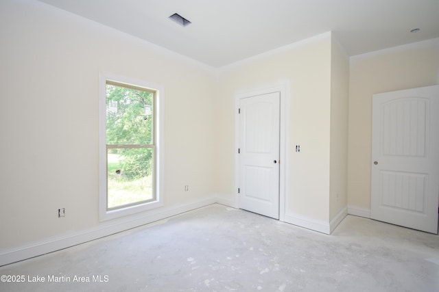 63 Noles Dr, Tallassee, AL 36078 - unfurnished bedroom featuring concrete flooring and baseboards
