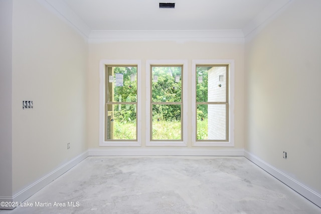 63 Noles Dr, Tallassee, AL 36078 - empty room featuring ornamental molding and unfinished concrete floors