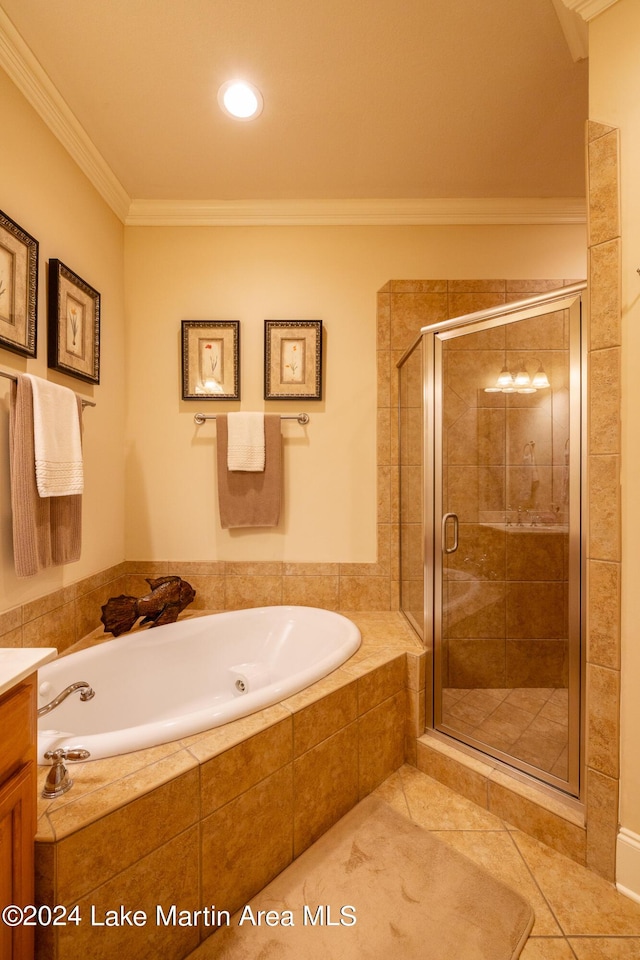 bathroom with tile patterned flooring, vanity, independent shower and bath, and ornamental molding