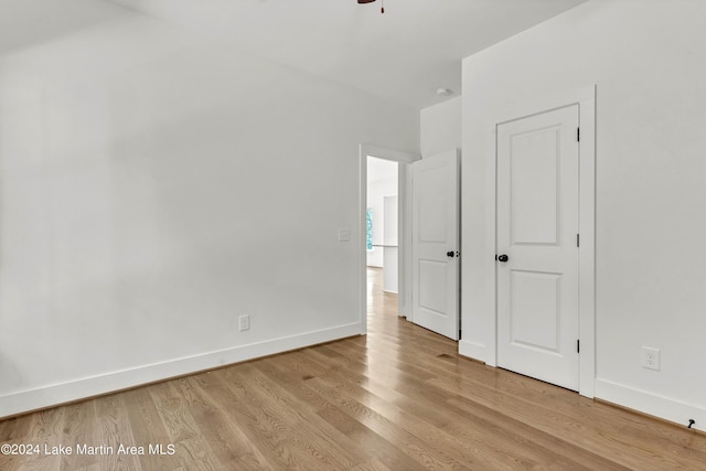 unfurnished bedroom with light wood-type flooring