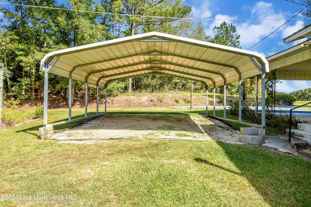 view of parking / parking lot with a carport and a lawn